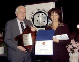 Engelbart recieving award posing with Valerie Landau